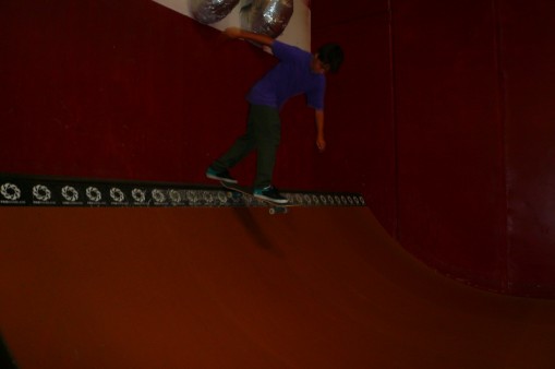 Jake Chough slickin' up the coping with a B/S tailslide.